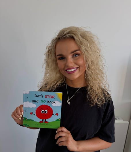 Anabel Thomas pictured alongside her childrens boom 'Dot's Stop and Go'
