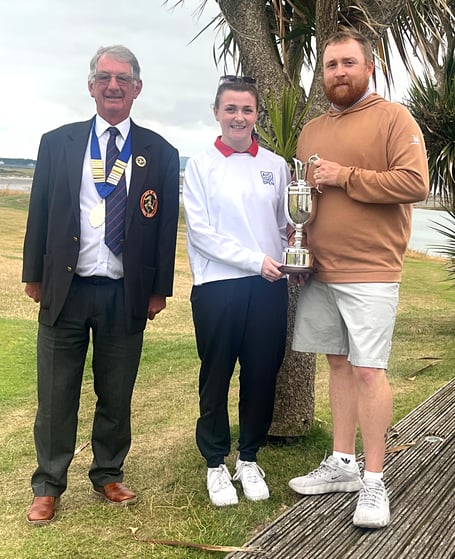 Brother and sister Rob and Emma Noon with the 72-Hole Strokeplay Championship trophy alongside Isle of Man Golf Union president Michal Kewley