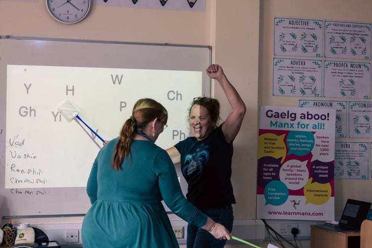 A high energy fly-swatting game leaves intermediate class member Annie Watkins victorious