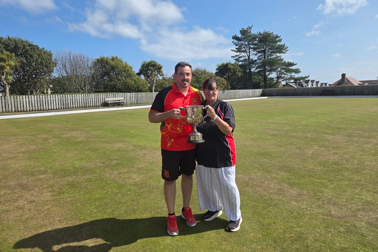 Singles champion Mark McGreal with past Lawn Bowls Isle of Man president Pam Makin