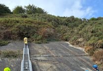 Boy clings to gorse bush above 39ft drop during cliff rescue