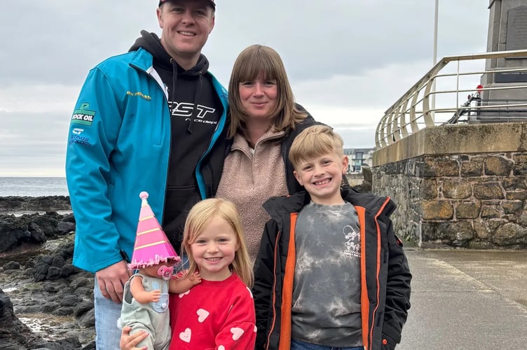 A beautiful family: Daniel Ingham sadly died during this year's Isle of Man TT qualifying in May, and wife Helayna now fears the family, including children Phoebe and Joey, may lose their home