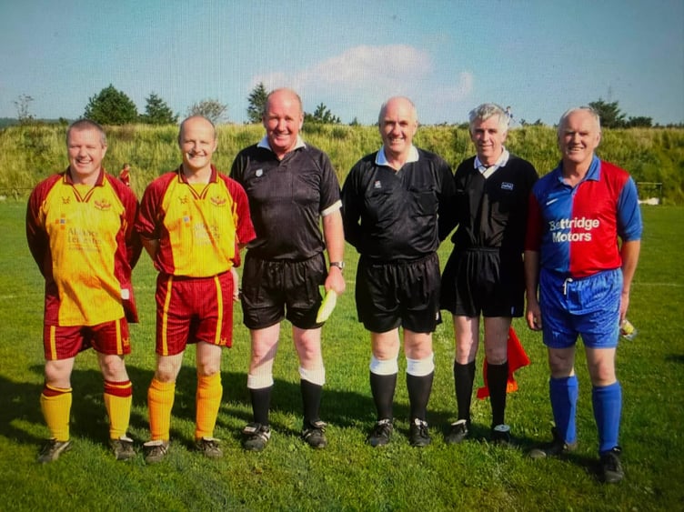 A family affair: It's not often you have so many family members on the same football pitch, including as officials! Brian 'Fox' Cain is on the far right in the Foxdale kit.