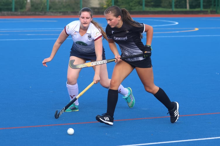 Vikings B's Molly Wheeler (right) evades the attentions of Bacchas B's Marie Lothian during their pool match (Photo: Paul Hatton)