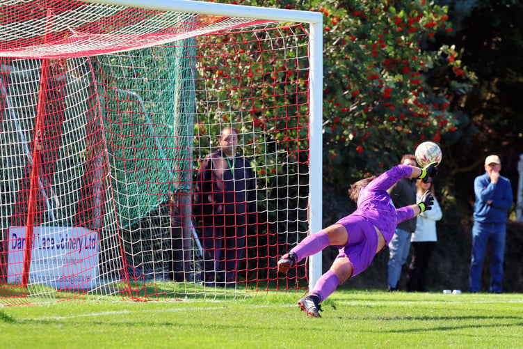 Peel goalkeeper Owen Dawson at full stretch to brilliantly save Brody Patience's penalty during the two sides' Canada Life Premier League clash at Douglas Road on Saturday afternoon (Photo: Dave Corkish)