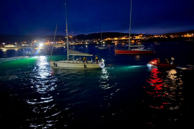 Port St Mary Lifeboat crews board a yacht drifting towards rocks in Bay ny Carrickey