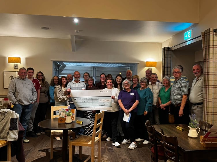 On Tuesday night, Ballaglonney Cooilingel presented the cheque to Isle Stand Up To Suicide at The Crosby Pub