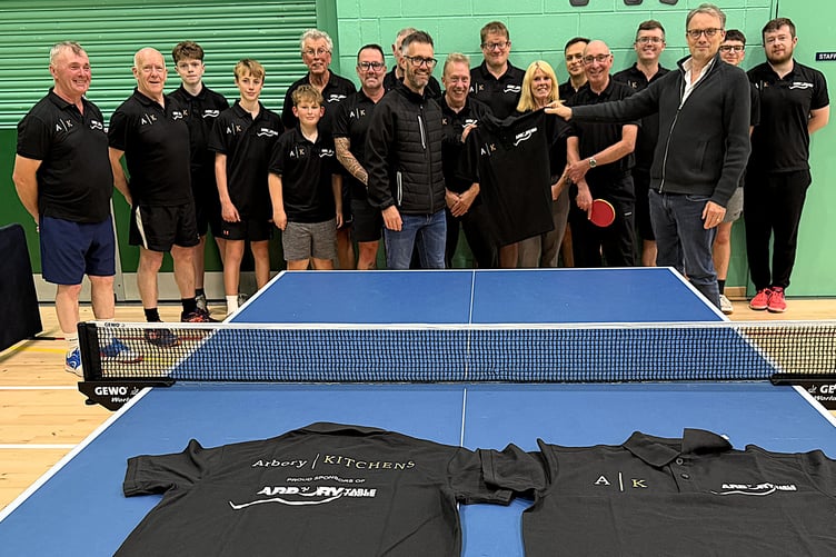 Arbory Kitchens directors Phil Moody (front left) and Paul Kelly (front right) presenting their sponsored shirts to Arbory Table Tennis Club (Photo: Malcolm Lambert)