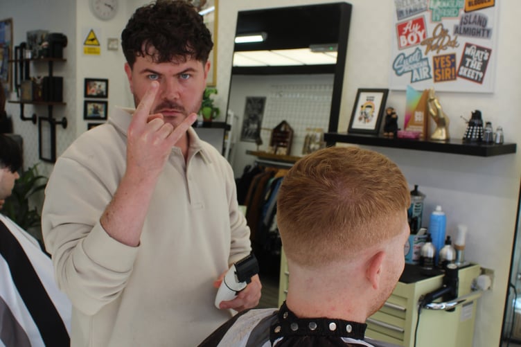 Josh cutting hair and looking rather cool doing it at Renegade Cuts and Clobber