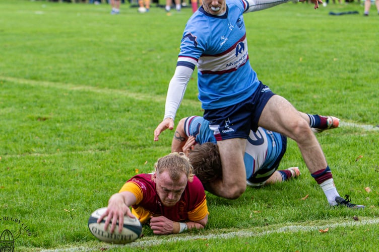 Craig Martin reaches out to dot down and score a try for Douglas Rugby Club against Wilmslow at Port-e-Chee on Saturday afternoon (Photo: Richard Ebbutt)