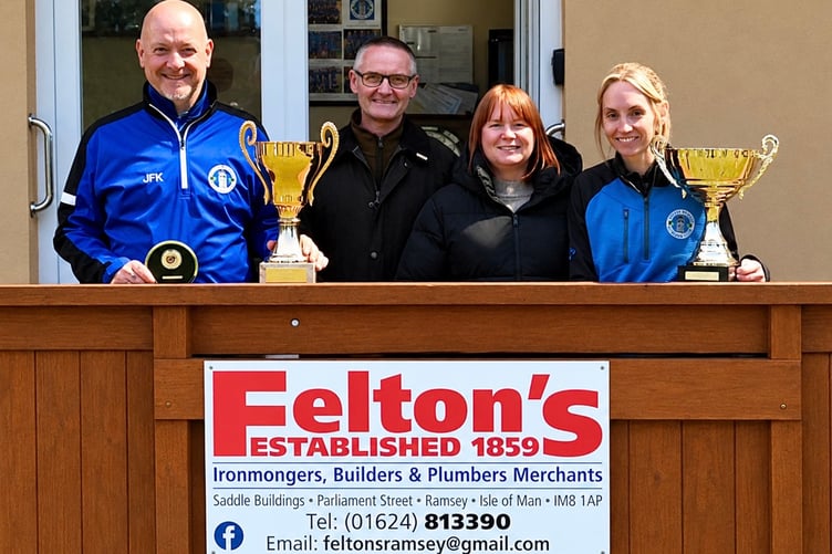 Felton’s Manx Masters winners John Kennish and Jenny Moore, either side of sponsors Chris and Lynnette Perry of Felton’s (Photo: Arnie Withers)