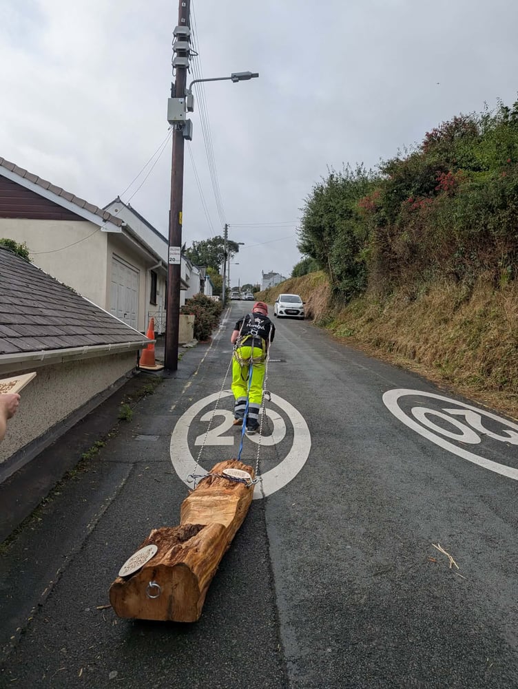 Owen Bevan dragging the log during his 42km journey