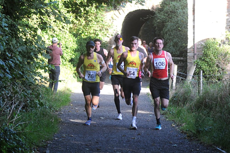 (L-r) Mark Burman with Matt Callister, Shaun McEntee and John Halligan during the early stages of Sunday's race. Burman led this group home in sixth place (Photo: John Watterson)