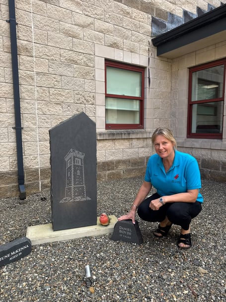 Diane with her son Daniel's stone in the Organ Donation Memorial Garden at Noble's Hospital
