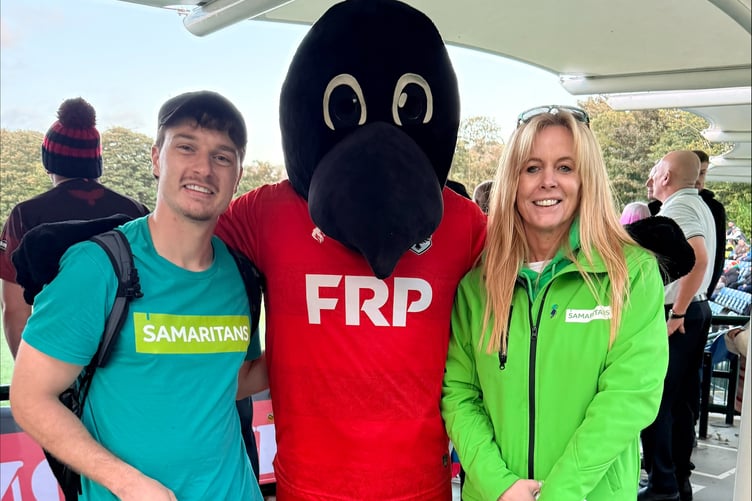Sid Batty pictured with the IOMFC Ravens mascot and Deana Douglas from Samaritans