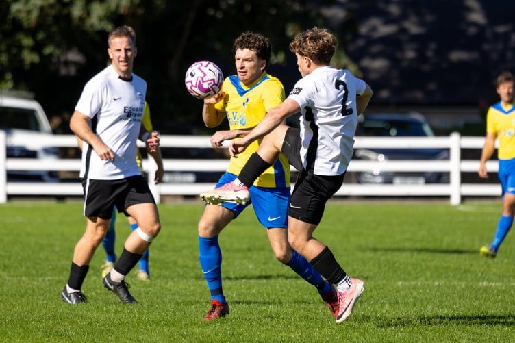 Corinthians' Morgan Naylor (right) and St John's United's Alex Holden compete for the ball during last weekend's 1-1 draw (Photo: Gary Weightman)