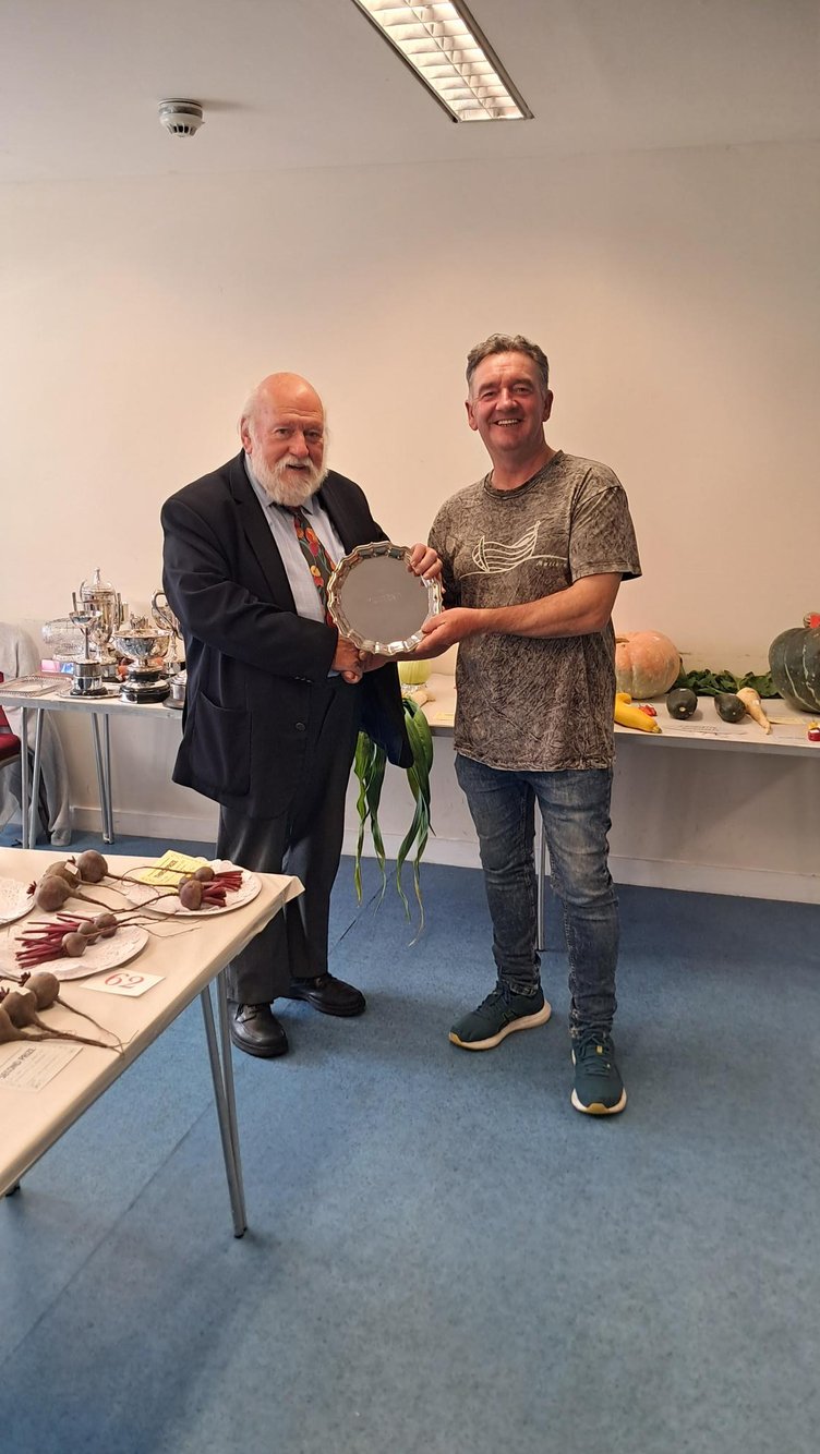 Robert Middleton being presented with his award