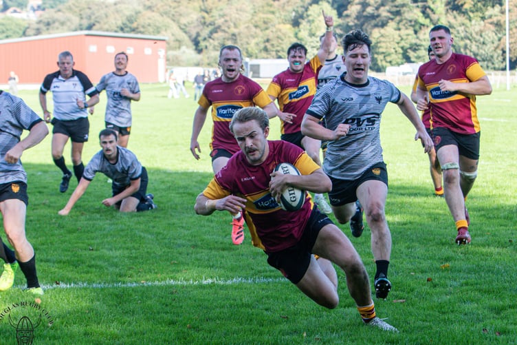 Wilf Kermode escapes the visitors' defence to dive in for one of the 10 tries that Douglas scored at Port-e-Chee on Saturday (Photo: Richard Ebbutt)