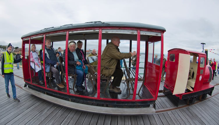 Lieutenant Governor Sir John Lorimer on board the pier tram