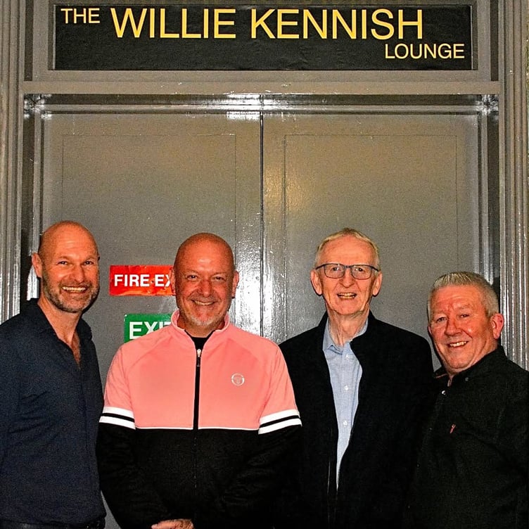 Members of the Kennish family in front of the new Willie Kennish Lounge at St Olave's