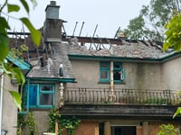 Road reopens following fire at derelict apartments