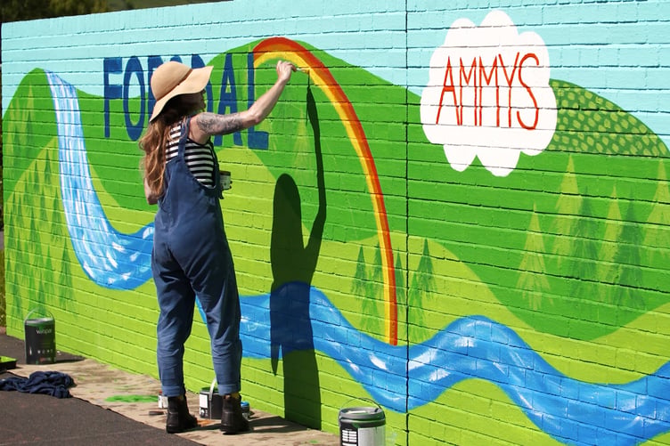 Foxdale school mural being painted by Kate Summerville