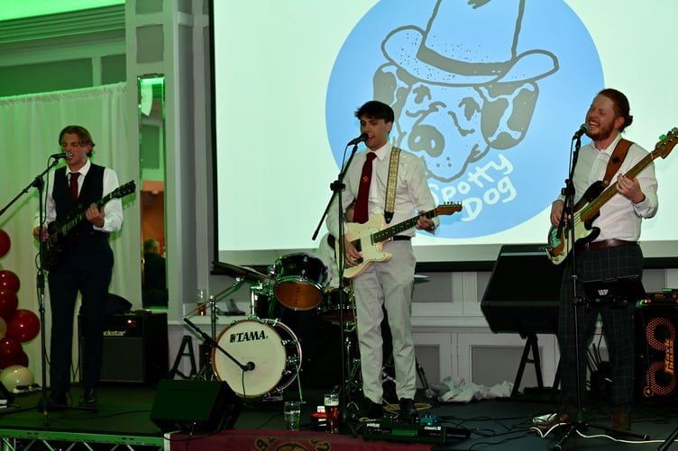 Spotty Dog were the live entertainment for the evening. Guitarists Patrick Knight (left) and Rob Harding (middle) are both members of Marown AFC