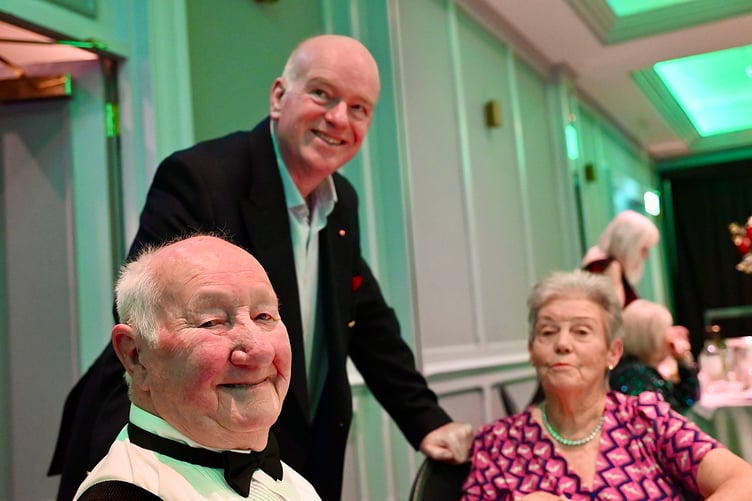 Howard Quayle (standing) with Mitch and Celia Joughin, who have all done so much work for the Memorial Playing Fields over the years