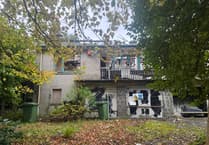 Police give update into major fire at derelict apartment block