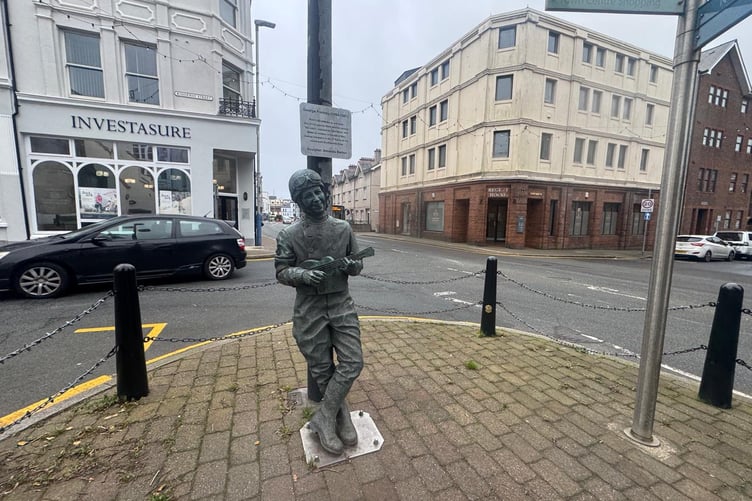 The George Formby statue is located at the junction of Lord Street and Ridgeway Street.