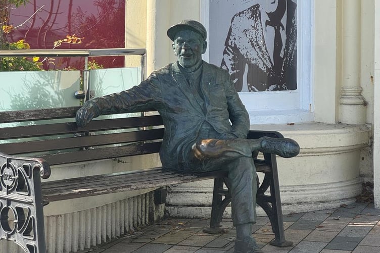 Sir Norman Wisdom looking out to sea on Douglas Promenade