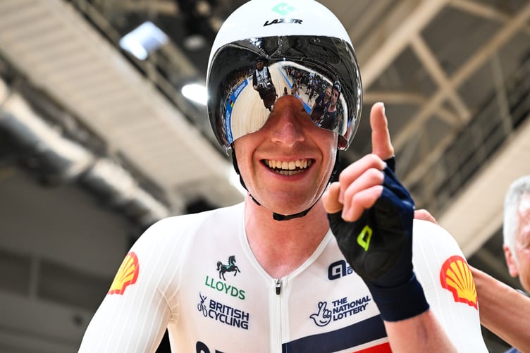 Matthew Bostock celebrates after clinching his maiden world title in China (Photo: Simon Wilkinson/SWpix.com)