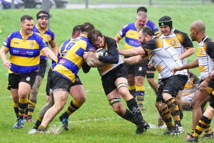 Vagas' Jon Ferguson (right) pushes team-mate Jack Goodwin into a tackle against Dukinfield (Photo: John Liver/Mumble's Pics)