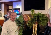 Pictures as pub Mhelliah raises £1,500 for charity