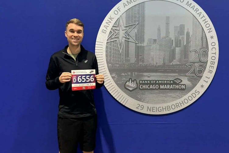 Stephen Garrett with his race number prior to the start of the Chicago Marathon