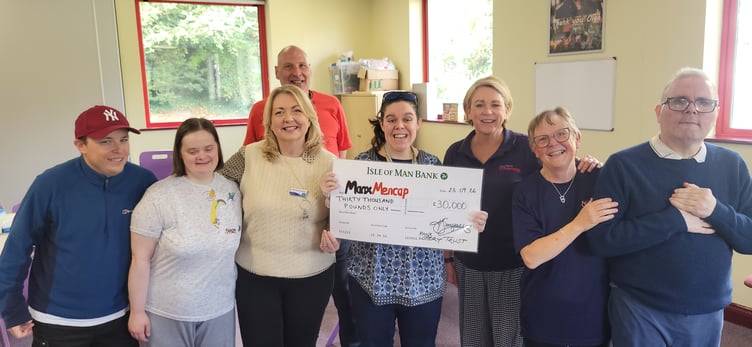 Manx Lottery Trust present the cheque to Manx Mencap