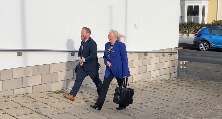Ms Edge arriving at Douglas Courthouse this morning with her nephew Andrew Jones, who acted as her counting agent