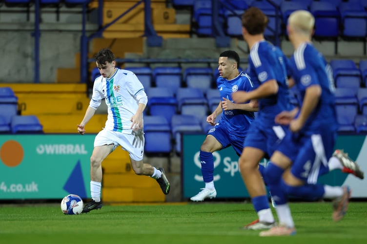 Jimmy Lowther (left) escapes the attentions of a Newcastle Blue Star player (Photo: Phil Bryan)