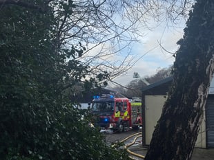 Crews Putting Out Fire in Union Mills Industrial Estate